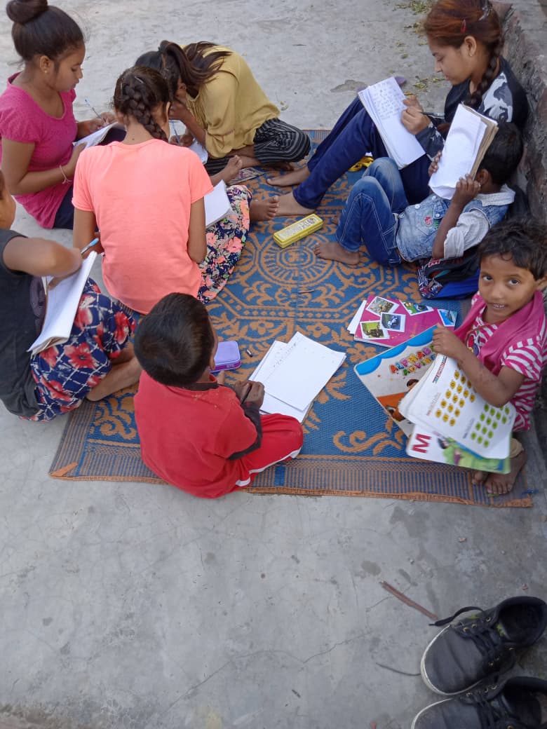 Children in classroom actively learning